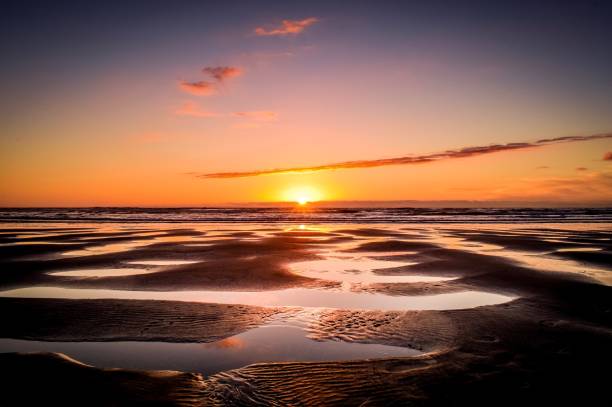 istock Sunset over Karioitahi beach black sand Waiuku 1067340790