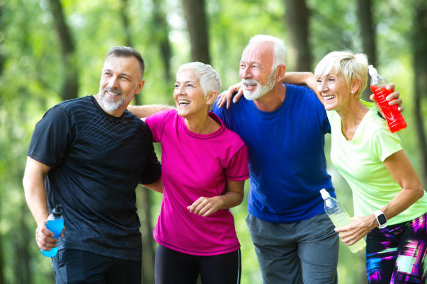 istock Active seniors resting after exercising outdoors 1067343166