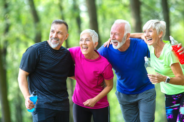 istock Active seniors resting after exercising outdoors 1067343294