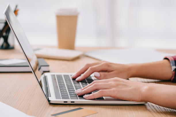 istock partial view of businesswoman using laptop while taking part in webinar 1067343614