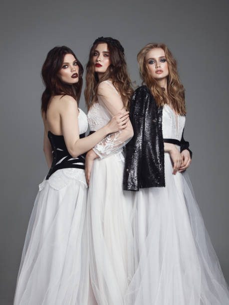 istock Beautiful brides in wedding dresses 1067348876