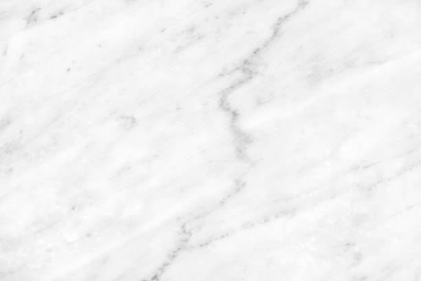 istock White Carrara Marble natural light surface for bathroom or kitchen countertop 1067348912
