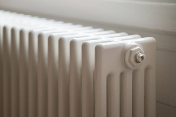 Column Radiator Central Heating White five column central heating radiator. Elegant modern version of traditional radiator, installed in Georgian house. georgian style photos stock pictures, royalty-free photos & images