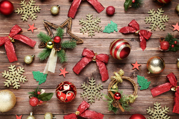 istock Colorful christmas decorations on brown wooden table 1067354022