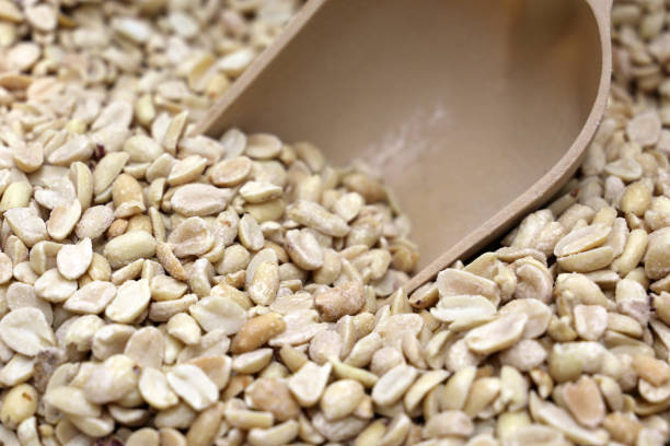 istock Peanuts and scoop on the market 1067354290