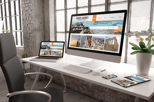 3d rendering of industrial office with devices showing travel agency website design