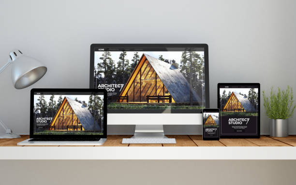 istock workplace with real estate online responsive website on devices 1067355480