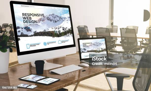 Computer Laptop Tablet And Phone With Responsive Web Design Website At Office Mockup Stock Photo - Download Image Now