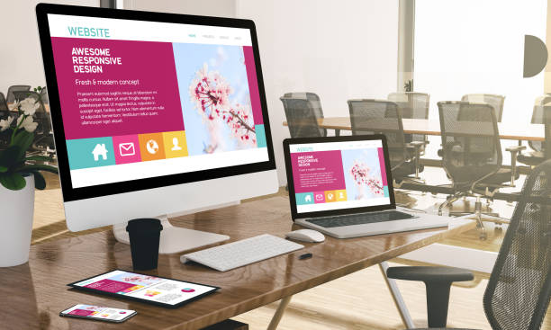 istock computer, laptop, tablet, and phone with fresh responsive website design at office mockup 1067358384