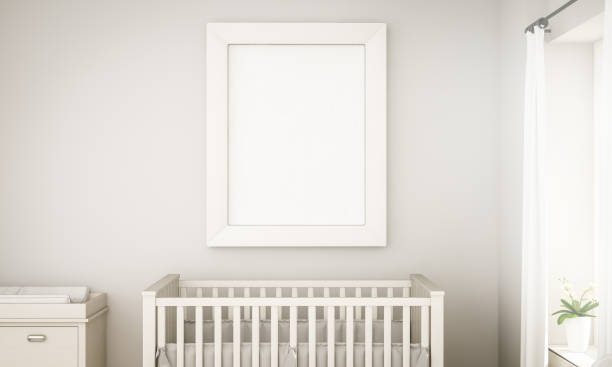 istock mockup of a white frame on unisex baby room 1067358536