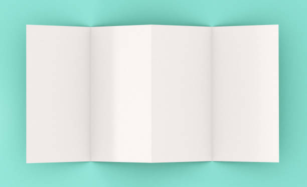 top view of four pages leaflet on blue background