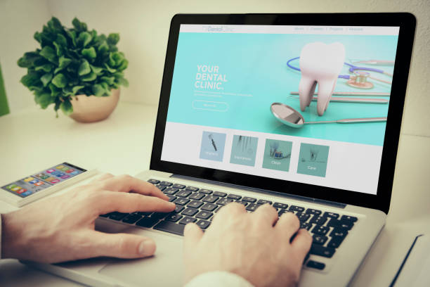 istock laptop on tabletop dental clinic 1067359310