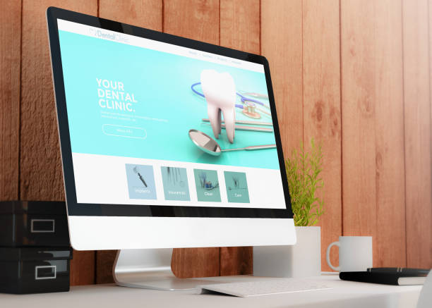 istock modern workspace with dental clinic website design 1067359338