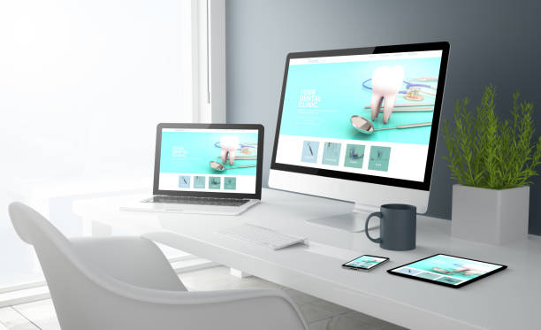 istock grey studio devices with dental clinic website 1067359348