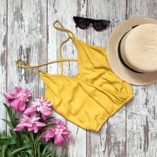 istock Yellow jersey on a wooden background 1067361980