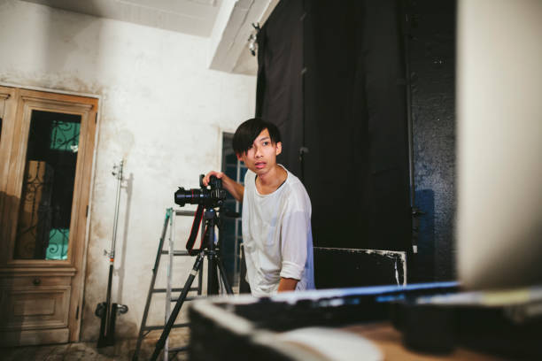 istock Photographer cheking photos on computer 1067362482