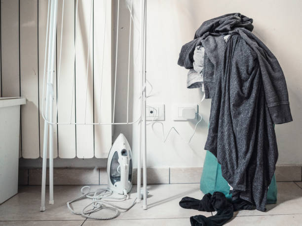 istock Messy room with scattered clothes 1067369554