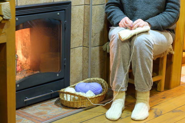 istock A woman knitting sock. 1067371240