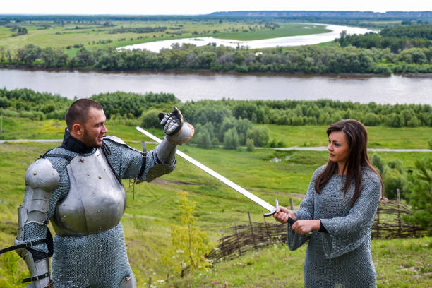 istock A lady in chain mail and a knight in armor 1067380426
