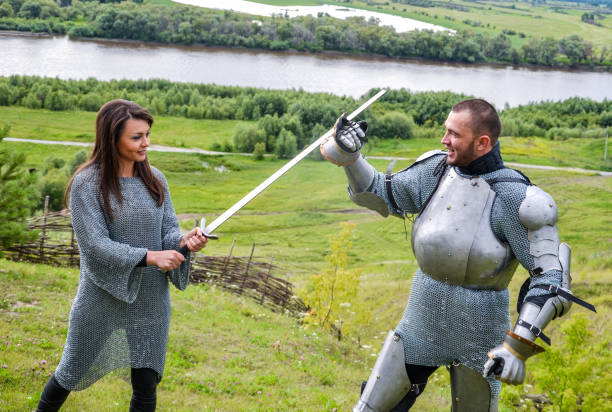 istock A lady in chain mail and a knight in armor 1067380462