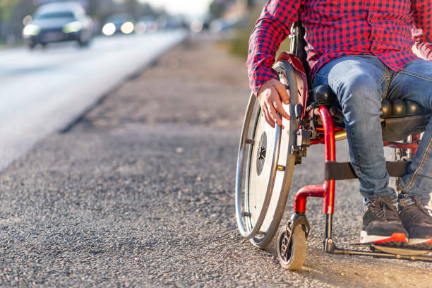 istock Disabled man preparing to go across the road 1067382998