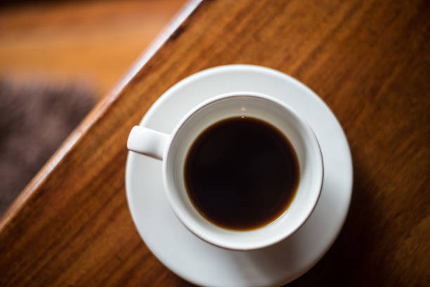 istock Close up coffee cup on blur background. 1067389394