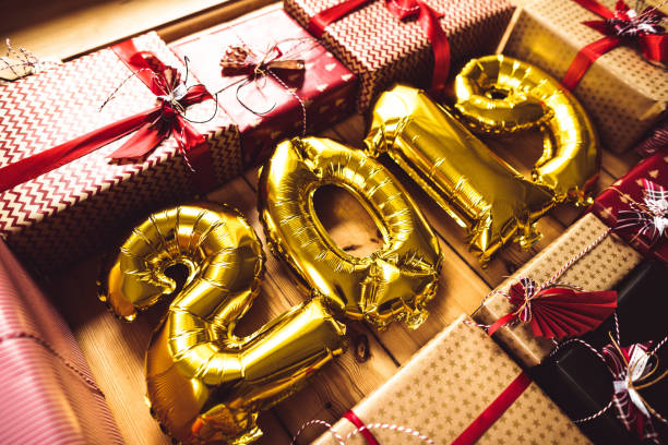 istock christmas present on parquet floor for the new year 2019 1067390806