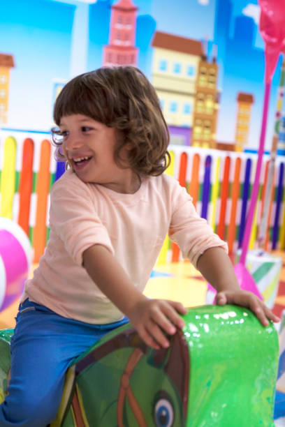 istock Happy smiley Little kid having fun on playground. 1067394534