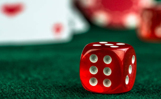 istock Gambling Red Dices and Poker Cards 1067408720