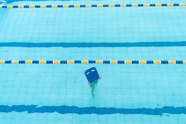 istock A girl in the pool 1067414778