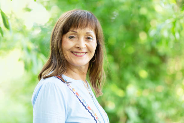 istock Senior woman outdoors portrait 1067427476