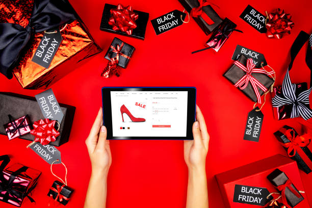 istock Customer buying new red high heels during black friday holiday 1067430088