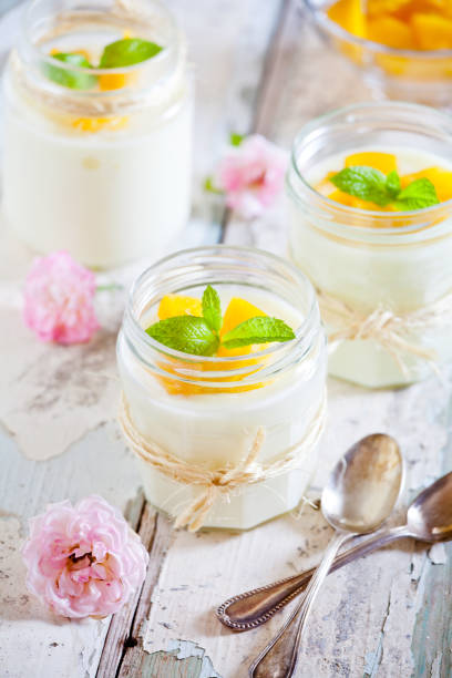 istock Jars Of Homemade Vanilla Pudding With Mango 1067430776
