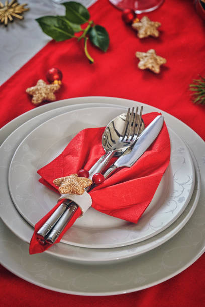 istock Decorated Table for Christmas Dinner with Candles and Christmas Ornaments 1067431544