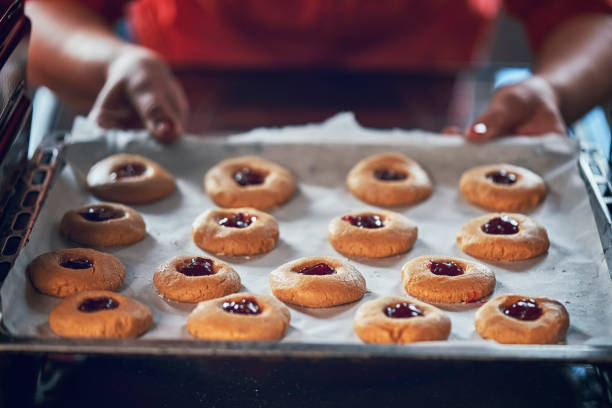 istock Baking Peanut Butter Cookies with Marmalade in Oven 1067433496