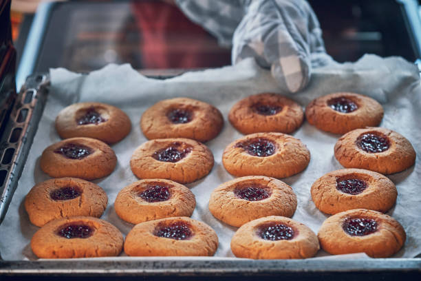 istock Baking Peanut Butter Cookies with Marmalade in Oven 1067433532