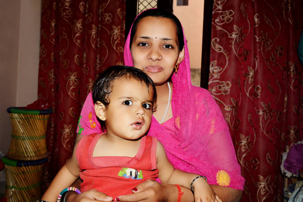 istock Mother & child portrait at home 1067433576