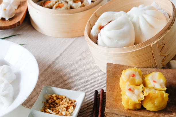 istock Set of Dim sum Enjoying traditional Chinese dumpling. 1067436538