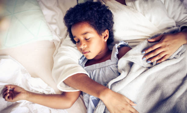 istock Safety in your mothers arms. 1067437638
