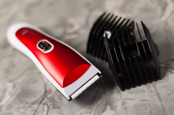 istock One red and white professional clipper on old gray concrete surface 1067437912