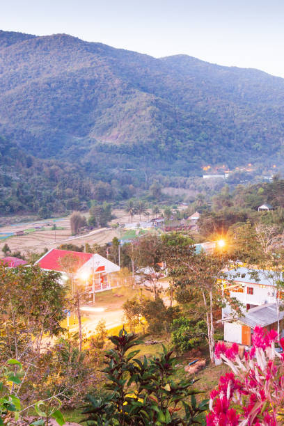 istock Beautiful view, Bo Kluea District at twilight, mountains backgrounds. The district has grown up two natural saltwater. Salt is still produced in the traditional way in Boklua. Ancient salt pits. Salt culture. History of salt. 1067446416