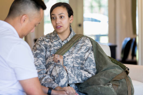 istock Female soldier is sad to leave on military assignment 1067448796