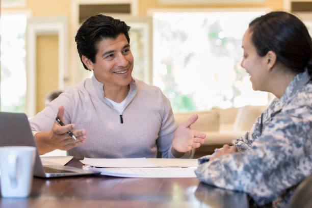 istock Couple review financial documents 1067448816