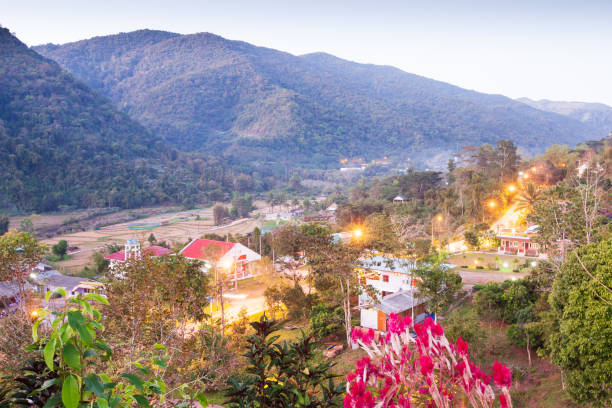 istock Beautiful view, Bo Kluea District at twilight, mountains backgrounds. The district has grown up two natural saltwater. Salt is still produced in the traditional way in Boklua. Ancient salt pits. Salt culture. History of salt. 1067448824