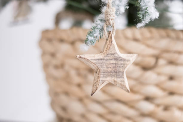 istock Wooden star on christmas tree 1067449282