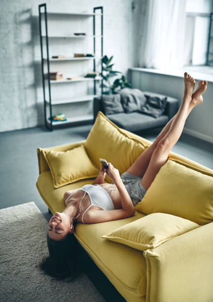 istock Young woman at home 1067451560