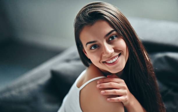 istock Young woman at home 1067452224