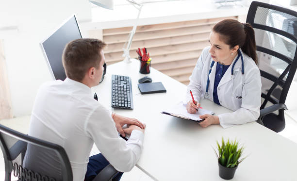istock The young man came to see the doctor. 1067452898