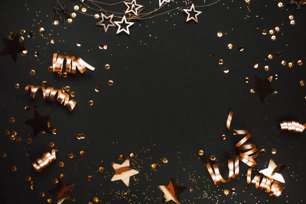 istock Golden decoration on black background. Place for text. 1067454782