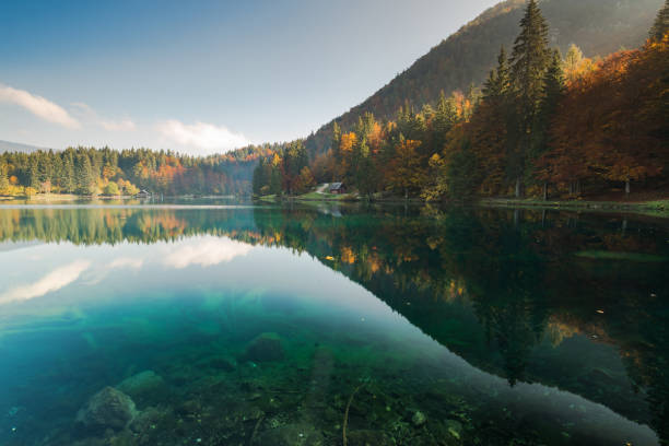 istock Fusine Lakes at autumn season 1067455658